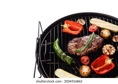 Barbecue grill with steak and vegetables on white background - Shutterstock ID 2034316862