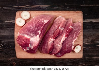 barbecue meat prepare, juicy pieces of fresh raw meat - cooking ingredients on  kitchen table