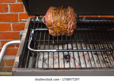 Barbecue Meat. Sunday Roast Beef Sirloin Joint Over Charcoal Is Ideal Easy Fuss-free Summer Cooking Rotisserie Cooked Or Grilled By Indirect Medium Heat Bbq Is Perfect For Backyard Family Entertaining