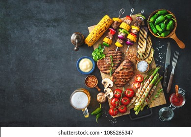 Barbecue Menu. Grilled Meat And Vegetables On Rustic Stone Plate 