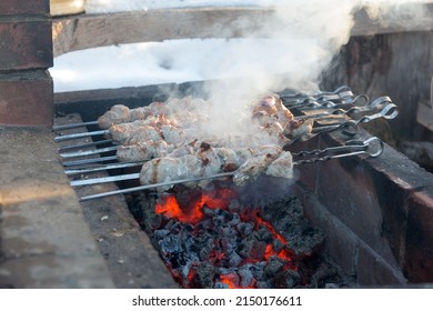 Barbecue On Coals In A Brick Hearth