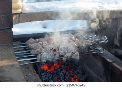 Barbecue On Coals In A Brick Hearth