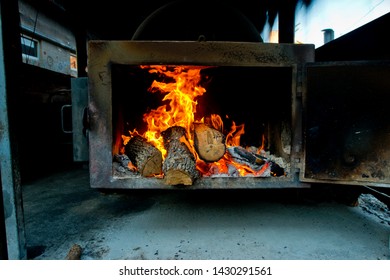 Barbecue Pit With Logs On Fire. Texas BBQ Flames. Meat. 