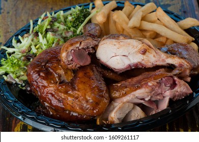 Barbecue Platters.  Brisket, Beef Ribs, Pork Ribs, Bbq Chicken Or Turkey Served With Classic Sides French Fries, Coleslaw Or Potato Salad. Traditional Classic Texas Style Bbq. 