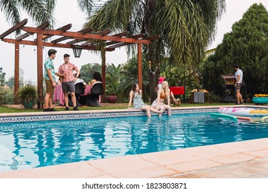 Barbecue at the pool.  Group of friends enjoy a day at the pool.  Concept of summer and friendship. - Powered by Shutterstock