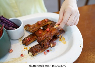 Barbecue Pork Rib - Grilled Pork Baby Ribs With Bbq Sauce Topped With Pomegranate Served With Sweet Potato Fries, Fresh Vegetable Salad And Creamy Mashed Potatoes, Healthy Food Concept.