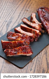 Barbecue Pork Ribs Or Bbq Catering Platter Of Meats. Traditional Texas BBQ: Beef Brisket, Beef Ribs, Pork Ribs, Sausage Links, Black Pepper Roasted Chicken, And Turkey Served With Homemade Sauce.