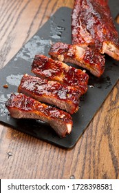 Barbecue Pork Ribs Or Bbq Catering Platter Of Meats. Traditional Texas BBQ: Beef Brisket, Beef Ribs, Pork Ribs, Sausage Links, Black Pepper Roasted Chicken, And Turkey Served With Homemade Sauce.