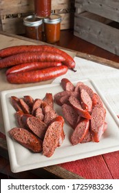 Barbecue Pork Sausages And Bbq Catering Platter Of Meats. Traditional Texas BBQ: Beef Brisket, Beef Ribs, Pork Ribs, Sausage Links, Black Pepper Roasted Chicken, And Turkey Served With Homemade Sauce.