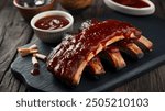 Barbecue Ribs: Tender, slow-cooked ribs slathered in smoky barbecue sauce. Fall-off-the-bone goodness with a sweet and tangy flavor that