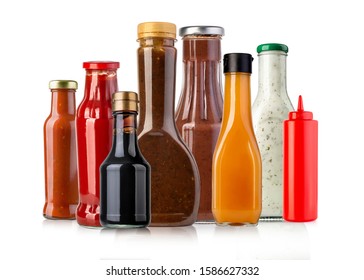 barbecue sauces in glass bottles on white background  - Powered by Shutterstock