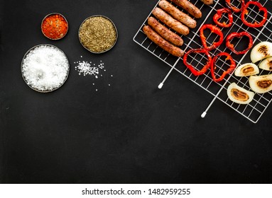 Barbecue, Sausages, Vegetables On Black Background Top View Mock Up