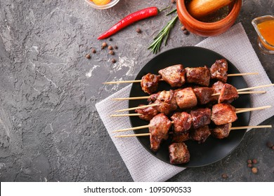 Barbecue Skewers With Juicy Meat On Plate