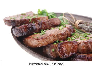 barbecued beef meat on pan isolated on white background