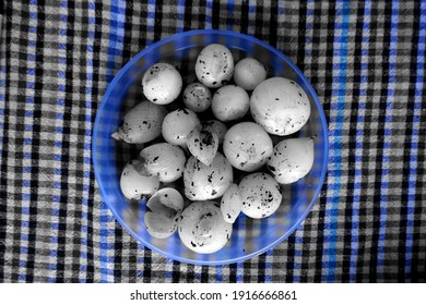 Barbecued Onions.roasted Small White Onion Seeds On The Plate On The Tablecloth                              