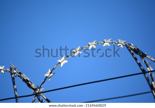 Barbed wire\
fences on the verge of\
civilization
