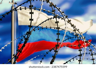 Barbed wire, Flagpole with Russian flag against sky in defocus, 3d rendering. Concept: international sanctions, aggressor country, totalitarian regime, iron curtain, socialism camp. - Powered by Shutterstock