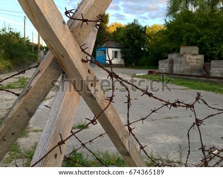 Barbed wire. Protected territory. Checkpoint
