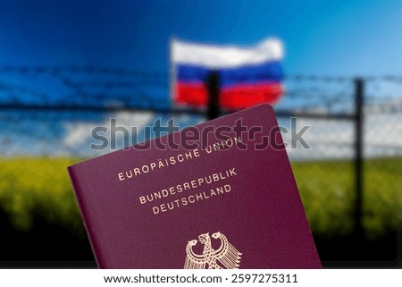 Barbed wire at the Russian border and a German passport