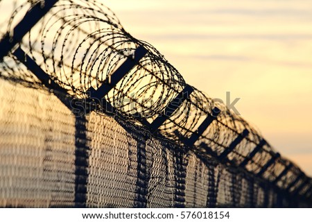 barbed wire steel wall against the immigations in europe
