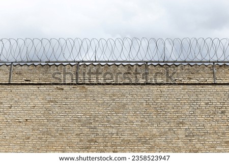 Barbed wire wall of a prison in Denmark