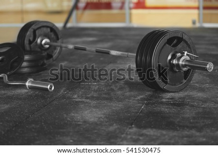 Barbell on floor in gym