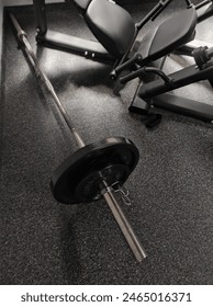 Barbell with weights at a gym