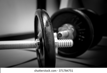 Barbells In A Gym Bar Bells And Rope At Cross Fit