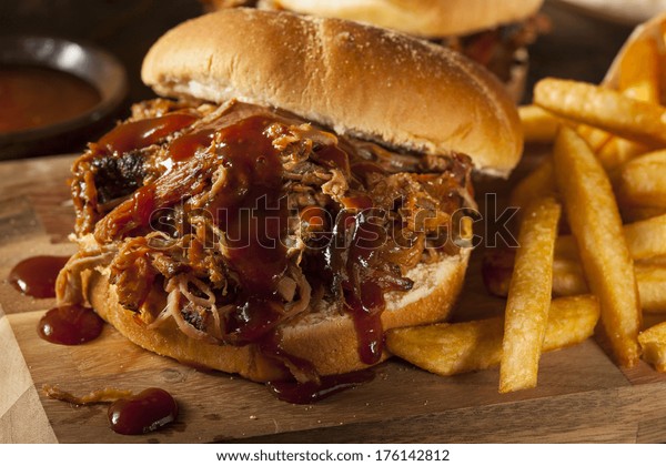 Barbeque\
Pulled Pork Sandwich with BBQ Sauce and\
Fries