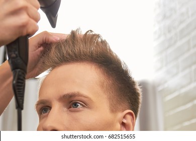 Barber Drying Hair, Close Up. Male Hair And Blow Dryer.