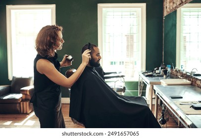 Barber, salon and hairdresser with comb for man for grooming, beard service and trim in boutique. Hair care, barbershop and stylist with client in chair for appointment, treatment and hairstyle - Powered by Shutterstock