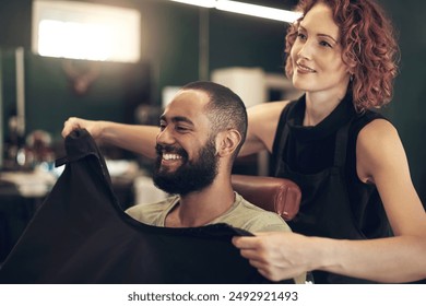 Barber, salon and hairdresser with man in chair for grooming, beard service and trim in boutique. Hair care, barbershop and beautician with happy customer for appointment, treatment and hairstyle - Powered by Shutterstock