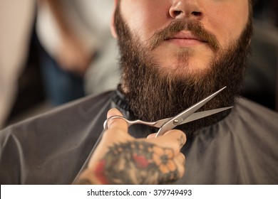 Barber With Scissors Shaving Bearded Man 