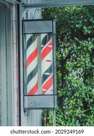 Barber Shop Pole At Barber Shop For Open And Closed Sign.