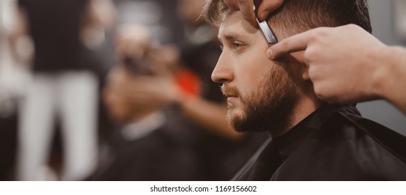 Barbershop, Man In Barber Chair, Hairdresser Styling His Hair Razor. Banner