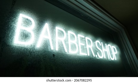 Barbershop Neon Window Sign At Night.