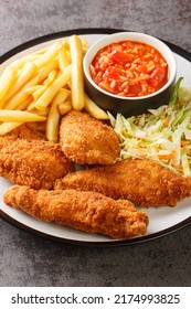 Barberton Fried Chicken With French Fries, Cabbage Salad And Hot Sauce Close Up In The Plate On The Table. Vertical
