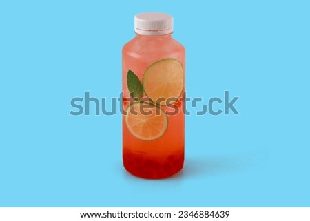 Barbie bubble ice lemonade with tapioca balls with juice, lime, mint on a blue background 1