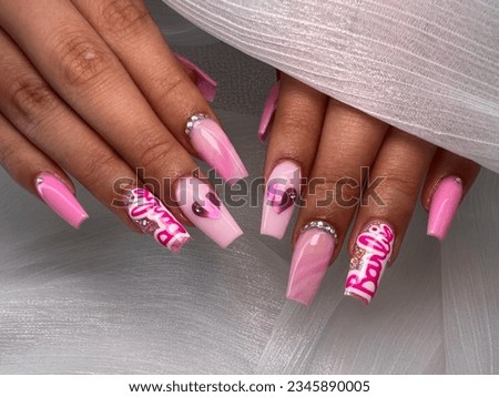 Barbie nail art designs, trendy Barbie nail art on acrylic nails set, pink color