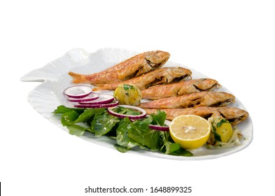 Barbun Fish On White Dish With Greens