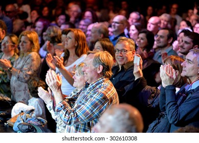 BARCELONA - APR 16: Spectators applauding in a concert at Luz de Gas stage on April 16, 2015 in Barcelona, Spain.