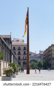 Barcelona, Catalonia, Spain; July 20th 2022: Huge Flag Pole With The Flag Of Catalonia. Catalan Flag On A Street In Barcelona.