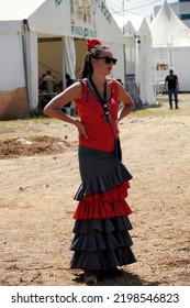 Barcelona, Catalonia, Spain, July 4, 2022: Young Woman Dressed As Flamenco In Religious Event