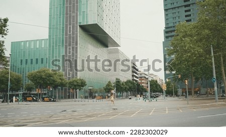 Barcelona. Cityscape crossroads. modern building backgrounds. Cars passing on the road