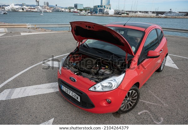 Barcelona, ​​Spain; December 25, 2021:\
Small red Ford Ka brand city utility car, detail\
engine