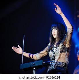 BARCELONA – DECEMBER 29: Eva Amaral Singer Of Amaral Band Playing A Theremin At The Fnac Music Festival In Palau Sant Jordi On December 29, 2011 In Barcelona, Spain.