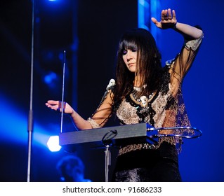 BARCELONA – DECEMBER 29: Eva Amaral Singer Of Amaral Band Playing A Theremin At The Fnac Music Festival In Palau Sant Jordi On December 29, 2011 In Barcelona, Spain.