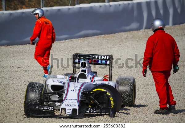 BARCELONA - FEBRUARY 19: Williams\
Martini Racing F1 car after collision at Formula One Test Days at\
Catalunya circuit on February 19, 2015 in Barcelona,\
Spain.