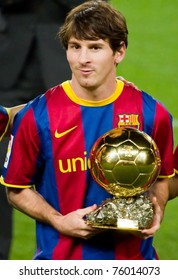 BARCELONA - JAN 12: Lionel Messi Poses With FIFA World Player Gold Ball Award On January 12, 2011 In Nou Camp Stadium, Barcelona, Spain.