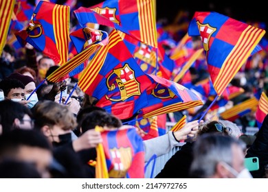BARCELONA - JAN 3: Fans with FC Barcelona flags at the Camp Nou Stadium on January 3, 2022 in Barcelona, Spain.
